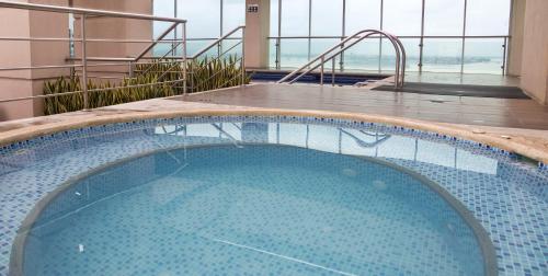 Riverfront I 1 piso 4 suite vista al rio Puerto Santa Ana Guayaquil — 4-Star Luxury Hotel in Guayaquil, Ecuador