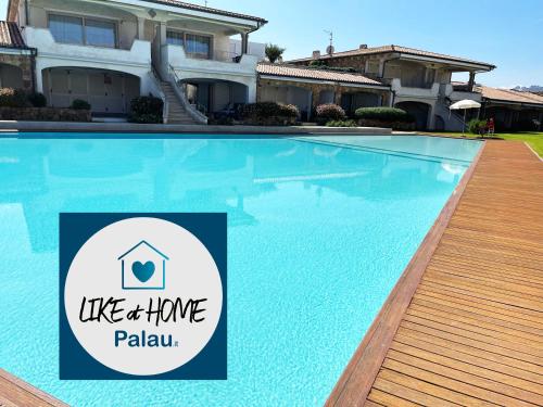 LIKE at HOME n 12 Poolside Garden Apartment — 4-Star Luxury Hotel in Palau, Italy
