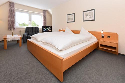 Hotel garni Poggenstool in Neuharlingersiel, Germany