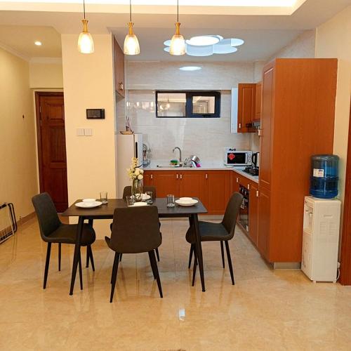 Enzi heights luxurious 2 bedroom furnished and serviced apartment with a poolgym and playground