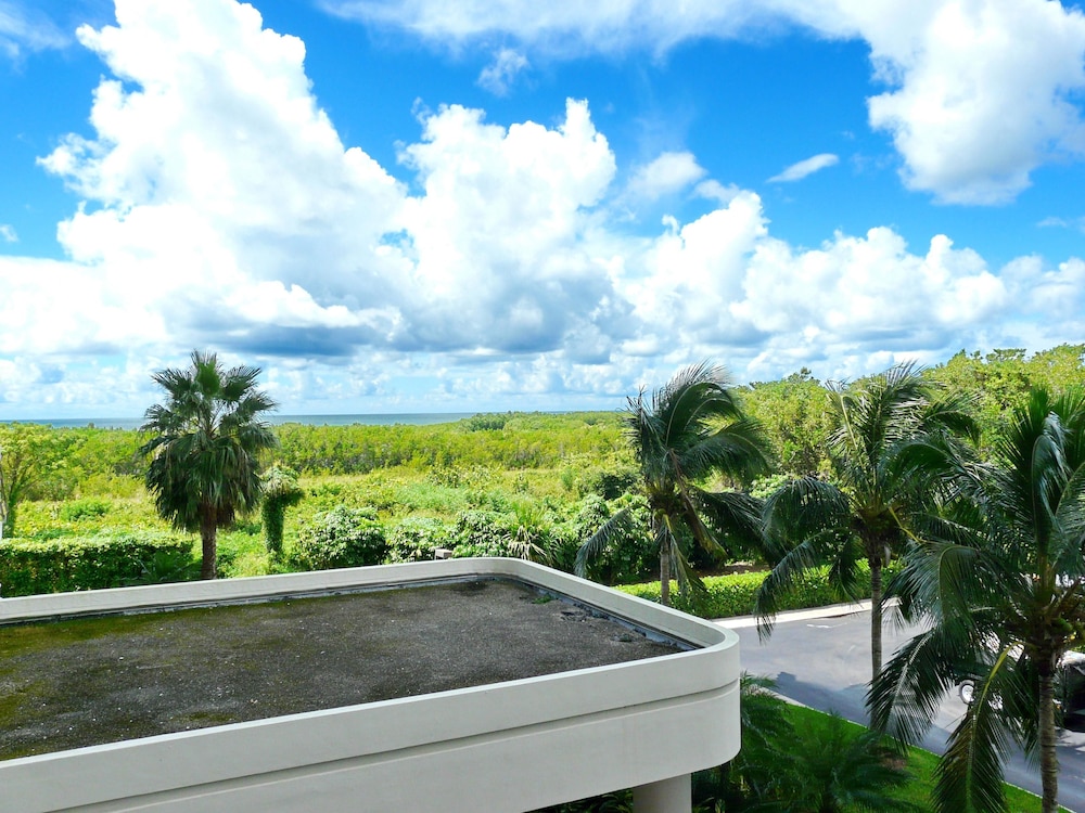Beachfront condo in resort style community with pool - photo 51
