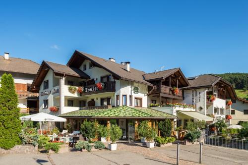 Garni Residence Trocker — 4-Star Luxury Hotel in Castelrotto, Italy