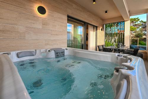 Aparthotel OLIVE with jacuzzi and breakfast in Novalja, Croatia