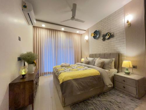 Hostie Spriha 3BHK Serviced Apartment near Golf course road & Worldmark Gurgaon