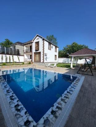 Gabala Milan Villa with indoor heated pool and jacuzzi — 5-Star Luxury Hotel in Qutqashen, Azerbaijan