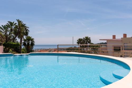 BmyGuest Sesimbra Palames Beach & Pool Apartment — 4-Star Luxury Hotel in Sesimbra, Portugal