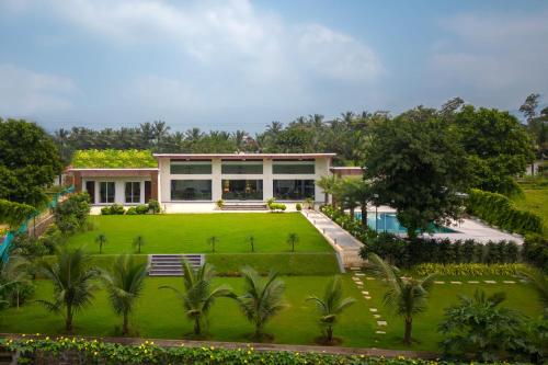 Natures Odyssey by StayVista Amidst lush greenery with Outdoor pool and Indoor activities — 5-Star Luxury Hotel in Karjat, India
