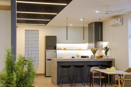 Lá Homestay — 4-Star Luxury Hotel in My Phuoc, Vietnam