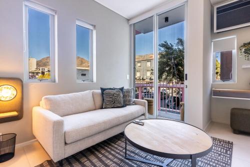 The Rose 107: Modern Corner Unit with Balcony