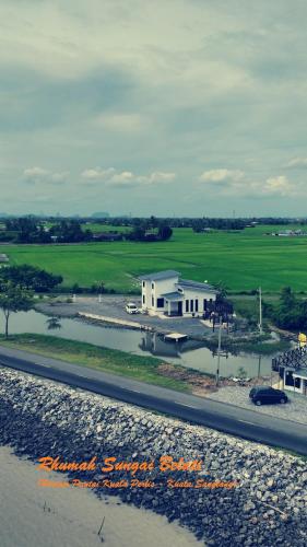 Rhumah Sungai Belati — Simpang Empat — photo 3