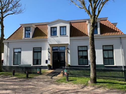 De Eerste Stuiver — 4-Star Luxury Hotel in Hollum, Netherlands