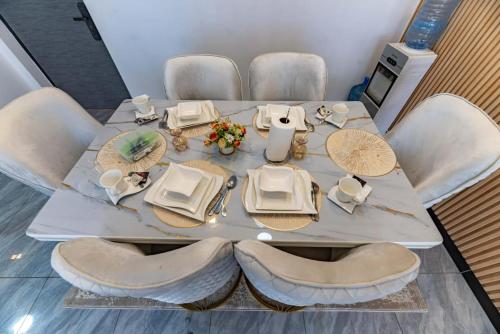 Elegant Luxury Three Bedroom Apartment With Swimming Pool Fully Equipped Gym Children Playing Ground Ample Parking Space And A Relaxing Rooftop With Breathtaking Scenic Views