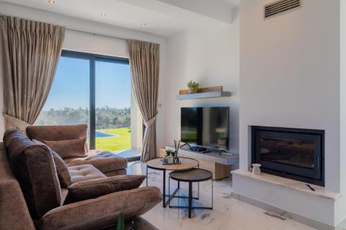 Villa Olivum by PosarelliVillas — 4-Star Luxury Hotel in Agios Matthaios, Greece