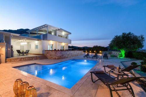Villa Alia — 4-Star Luxury Hotel in Archangelos, Greece