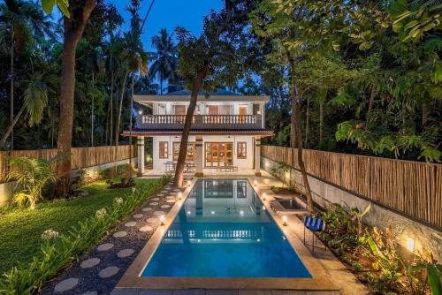 SaffronStays Atmos 3BR rustic pool villa with projector screen table tennis carrom & cozy family spaces in Nagaon — 4-Star Luxury Hotel in Alibag, India