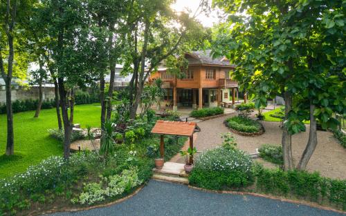 Luxury Wooden Villa in a Secret Garden Downtown — 4-Star Luxury Hotel in Chiang Mai, Thailand