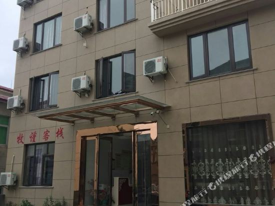 Xiangshan xinqiaomujin Inn in Menghai, People's Republic of China