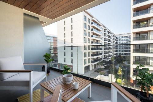 Contemporary Haven 1 BR with a Balcony Charm — 4-Star Luxury Hotel in Bucharest, Romania