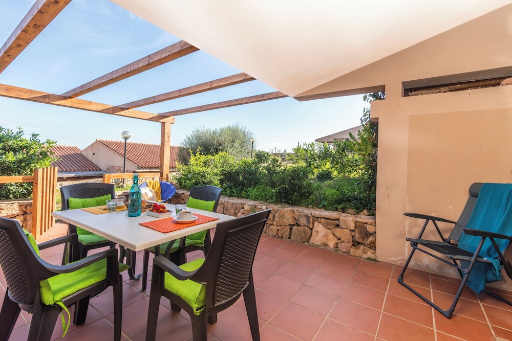 Sandy Bear Guesthouse Happy Rentals — 4-Star Luxury Hotel in Palau, Italy