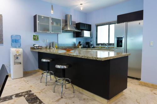 Paseo Del Sol Surf 203 condo — 4-Star Luxury Hotel in Playa Del Carmen, Mexico