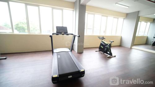 Cozy Living and Tidy 2BR at Puncak Dharmahusada Apartment By Travelio — 4-Star Luxury Hotel in Surabaya, Indonesia
