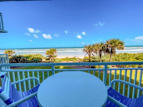 Oceanfront views on no drive beach with complex pool in New Smyrna Beach, United States
