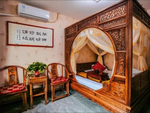 Pingyao Ancient City Manqiankun Inn County Yamen Branch - carbon neutral hotel in Gutao