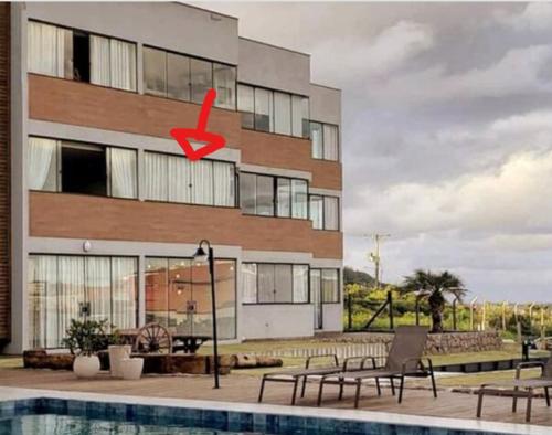 Loft 207 com vista para a piscina e Farol — 4-Star Luxury Hotel in Laguna, Brasil