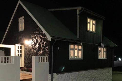 Peddastova in the heart of fishing village Skopun in Skopun, Faroe Islands