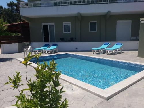 Greek Style Ground Floor Apartment & Pool — 4-Star Luxury Hotel in Ialysos, Greece