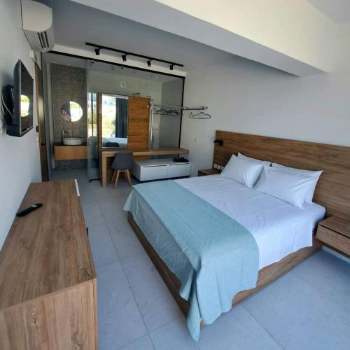 Courtyard Luxury Suites Apostolos — 4-Star Luxury Hotel in Pefki, Greece
