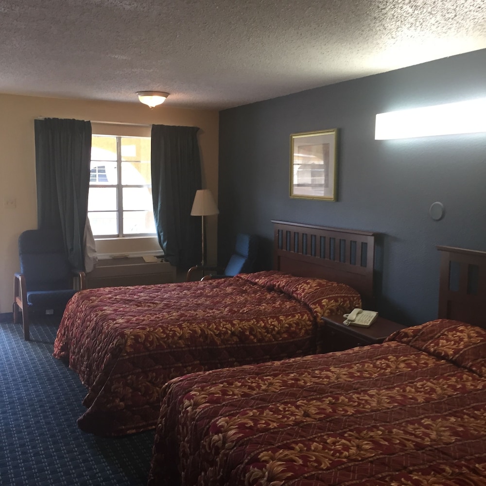 Guest Inn & Suites - photo 11