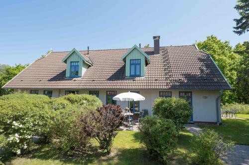 Ferienhaussiedlung Strandperlen Küstenhof 3c — carbon neutral stay, Wustrow