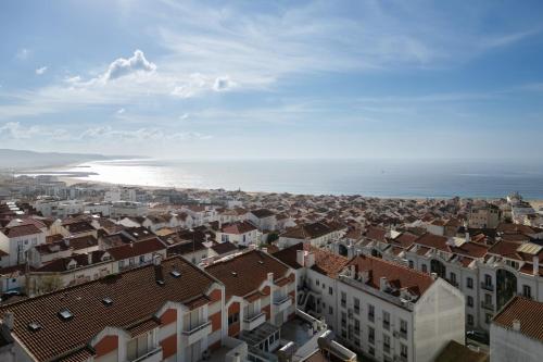 Host Wise Charming House with Ocean View — 4-Star Luxury Hotel in Nazare, Portugal