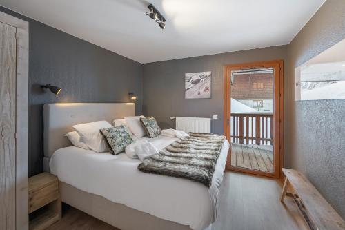 Les Loges Blanches Apt C001 BO Immobilier Multipass A tAc en option au tarif de 3euros par jour et par personne — 4-Star Luxury Hotel in Chatel, France