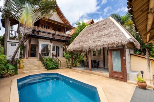Villa Ayutthaya at Kantiang Bay — 4-Star Luxury Hotel in Ko Lanta, Thailand