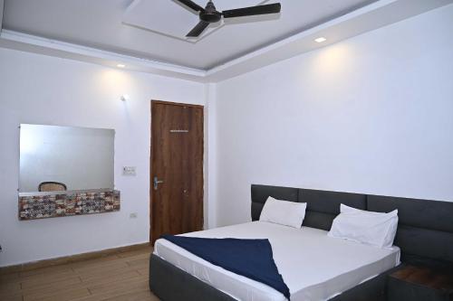 Hotel O Subharti University Formerly Hotel Club 9 in Meerut, India