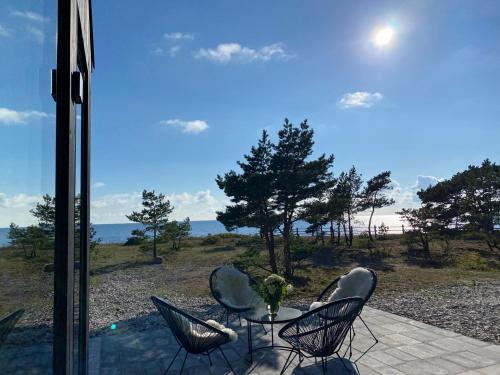 Seaside Rendezvous 2 - carbon neutral hotel in Unknown City