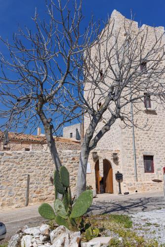 Lithos Traditional Tower — Unknown City — photo 2