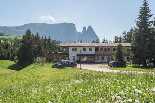 Ferienparadies Sabina Santner — 4-Star Luxury Hotel in Castelrotto, Italy