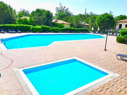 The Villages C2 Suite Apart Havuz Balkon Peyzaj — 4-Star Luxury Hotel in Oeluedeniz, Turkey