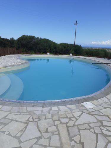 Gli Olivastri con piscina solarium vista mare sole mare e tanta natura climatizzatore wifi in Aglientu, Italy