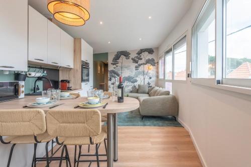 Suites Kerlarros Clim Et Parking Face Gare Et Port in Gujan-Mestras, France