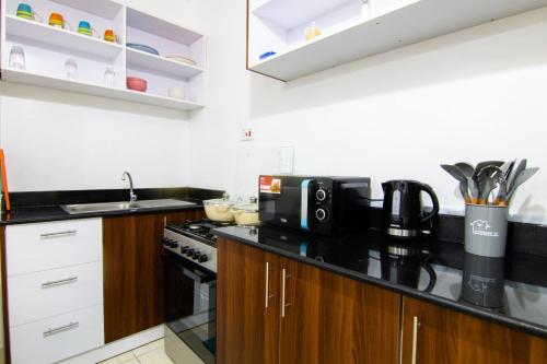 Rooftop Luxe with Queen Bed Gym and Netflix — 4-Star Luxury Hotel in Nairobi, Kenya