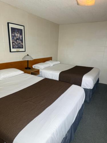 Sunrise Motel in Unknown City, Canada