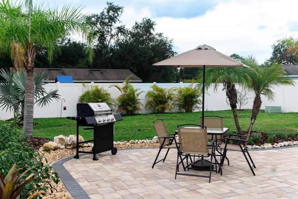 Tropical Backyard Paradise Hot Tub Fenced yard in Lakeland, United States