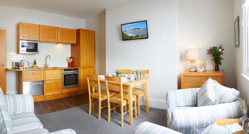 Apartment 18 The Moorings Right on the front Beautifully furnished Light bright and Airy