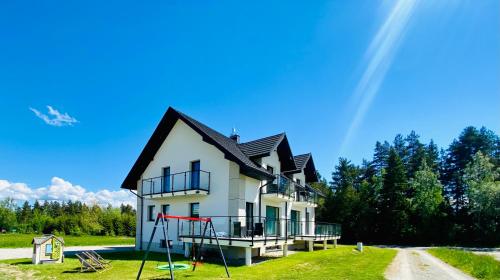Apartamenty Przełom Białki plac zabaw wiata grillowa — 4-Star Luxury Hotel in Nowy Targ, Poland