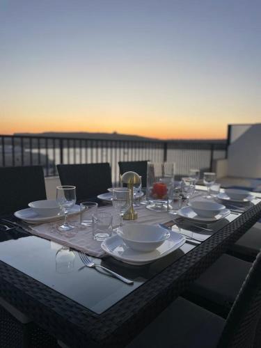 Seafront Penthouse with Large Terrace and Panoramic Views Mellieha Bay Ghadira — 4-Star Luxury Hotel in Mellieha, Malta