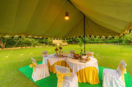 StayVista at Peacocks & Partridges with Amidst Greenery Terrace Indoor Fireplace Bar & Snooker Table